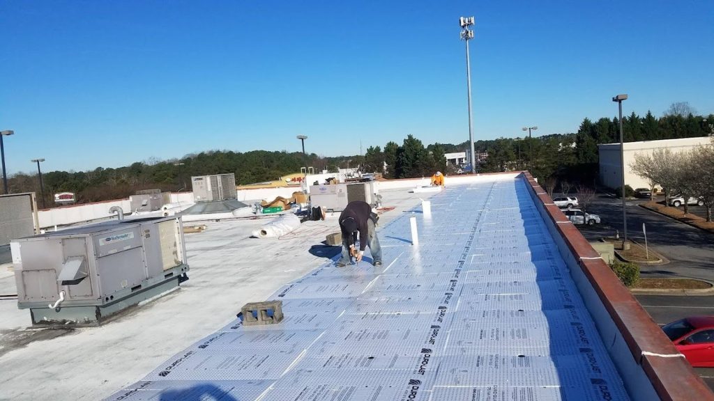Corus Roofing commercial roofing project in Atlanta, GA. Expert installation of durable, energy-efficient flat roofing for businesses and industrial buildings.