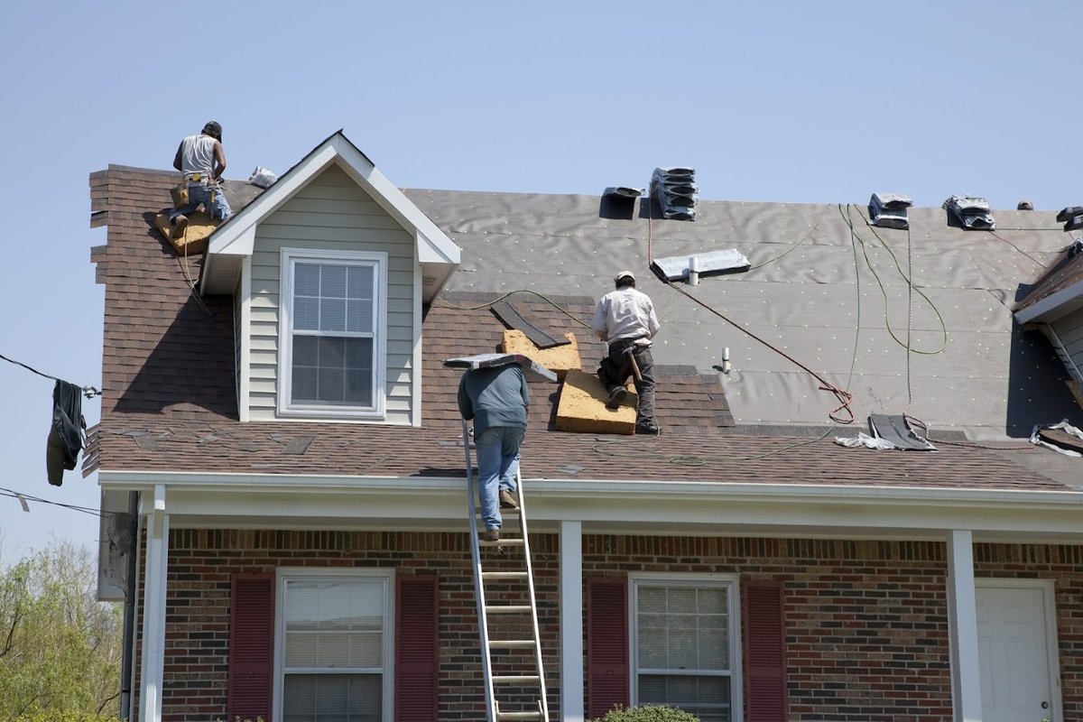 Professional asphalt roof installation in progress, ensuring durability, weather resistance, and expert craftsmanship for long-lasting home protection.