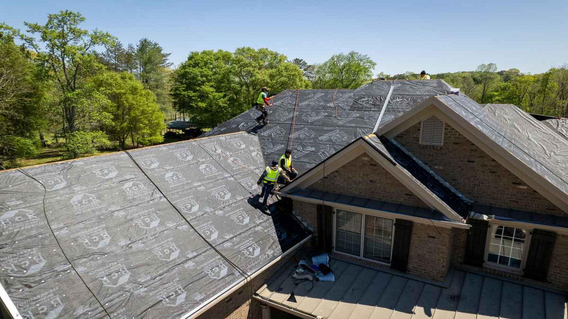 Corus Roofing professional roofers installing a high-quality roofing system in Atlanta, GA. Durable and weather-resistant roofing solutions for residential properties
