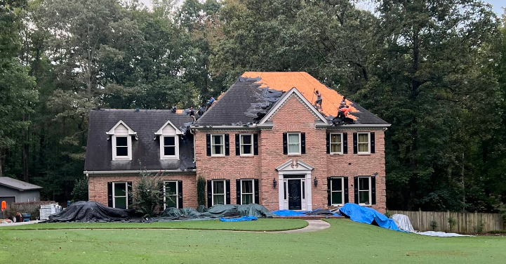 Emergency roof repair in progress on a newly constructed home. Professional roofing services ensuring durability and protection against weather damage